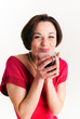 Young woman with a cup of hot drink