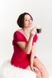Young woman with a cup of hot drink