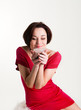 Young woman with a cup of hot drink