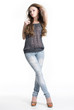 Beautiful  young sexy woman in jeans in studio
