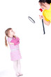 little girl and screaming mother with megaphone