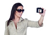 Sexy girl with sunglasses making a picture