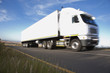 Semi-truck driving on remote road