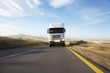 Semi-truck speeding on remote road