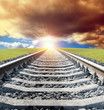 rail goes to sun in dramatic sky rail goes to sun in dramatic sky