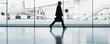 Businessman with suitcase in airport