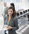 Businesswoman drinking coffee in office