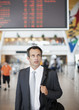 Businessman with briefcase in airport