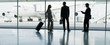 Businesspeople with suitcase in airport