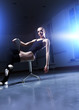 young ballerina is relaxing in class room