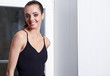 young ballerina is relaxing in class room