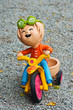 boy riding bicycle  doll clay
