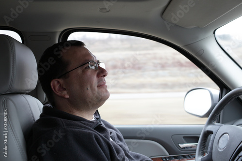 Photo: Man in car Man in car