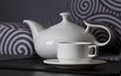 White teapot with a mug White teapot with a mug