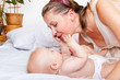 Photo: Mother looking at baby Mother looking at baby