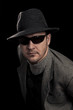 Man with hat and sunglasses
