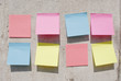 Sticky notes on the concrete wall