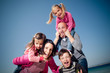 Happy family smiling and having fun outdoors