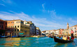Venice Grand canal with gondolas and Rialto Bridge, Italy Venice Grand canal with gondolas and Rialto Bridge, Italy