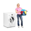 Full length portrait of a woman carrying a laundry basket