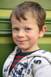Sourire naturel et spontané d'une canaille (5-6 ans)