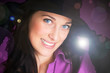 Portrait of a beautiful brunette young woman smiling with gloves Portrait of a beautiful brunette young woman smiling with gloves