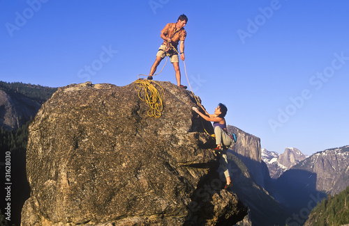 Photo: Team of rock climbers. Team of rock climbers.