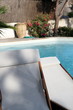 Swimming pool and deckchairs in Moraira Valencia Spain