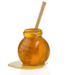glass pot full of honey isolated glass pot full of honey isolated