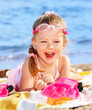 Child Playing On  Beach.