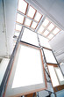 Pictures are within framework fastened on  metallic construction