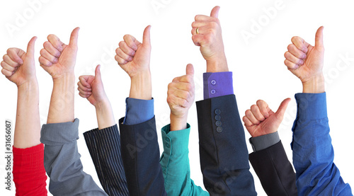 Photo: Business team thumbs up for support Business team thumbs up for support