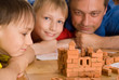 Father with children playing