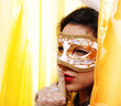 Woman wearing a carnival mask