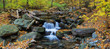 Autumn creek panorama and foliage