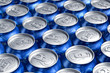 Macro of metal cans with refreshing drinks or beer