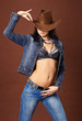 Beautiful sexy girl in jeans and cowboy hat Beautiful sexy girl in jeans and cowboy hat