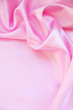 Photo : Smooth elegant pink silk as background Smooth elegant pink silk as background