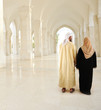 Muslim Arabic couple inside the modern mosque