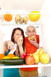 Couple eating cakes