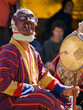Photo: Bumthang, Bhutan - October 2010: A masked man making music durin Bumthang, Bhutan - October 2010: A masked man making music durin