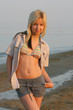Girl posing on beach.