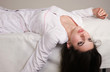 Lifeless nurse lying on the sofa