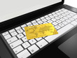 Illustration: gold credit card on laptop gold credit card on laptop
