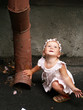 Toddler girl and rainwater pipe