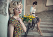 Retro style photo of two young beauties