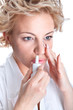 Woman  use an  bronchial inhale
