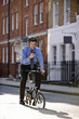 A businessman checking directions using his mobile phone