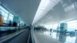 People moving in Barcelona airport. Slow motion.