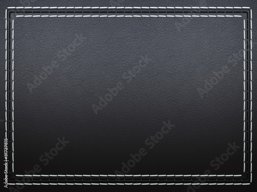 Photo: Stitched frame on black leather background Stitched frame on black leather background